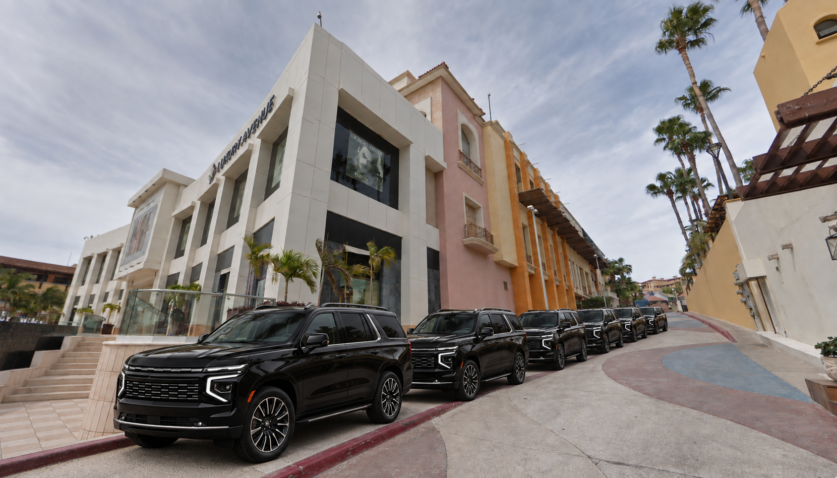 Glossy black SUV convoy outside luxury avenue